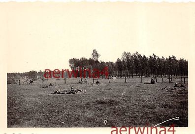 deutsche Soldaten in Deckung in Erdlöchern