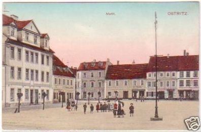 27797 Ak Ostritz Markt mit Geschäften um 1910
