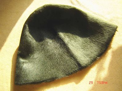 Hutstumpen Melousine Haar lang Stumpen dkl oliv 70 gr Ü 53 cm Rd 81 Stu 633