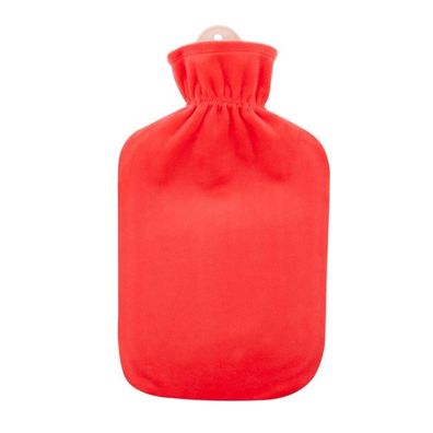 Flauschbezug koralle mit Wärmflasche
