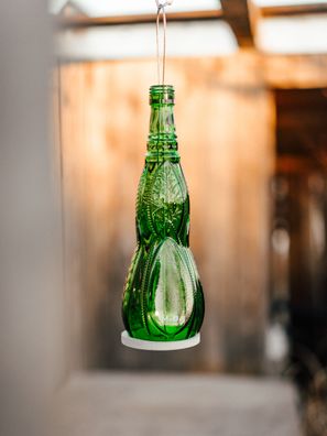 Tunel de Mallorca - die typisch grüne Flasche mit den Kräuteremblemen