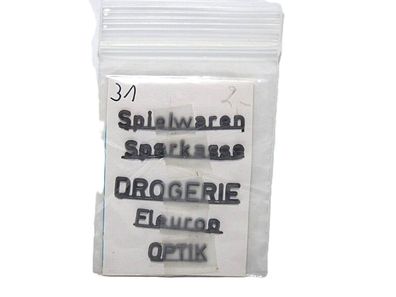 5 Gewerbeschilder - Spielwaren - Sparkasse - Drogerie - Fleurop - HO - 1:87 - Nr. 31