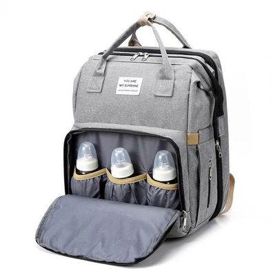 Mutter-Kind Rucksack mit Wickelbett - Tragbar, groß & mit Flaschenfach