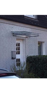 Vordach aus Edelstahl Modell Elegance mit VSG-TVG Türvordach Wetterschutz Überdachung