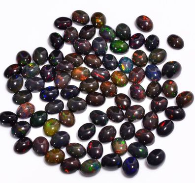 2 Stück ovale schwarze Opale Cabochone ca. 4 x 6 mm (OP110725)