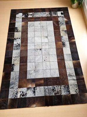 Patchwork Kuhfell Teppich mit Rahmenmuster aus Quadraten