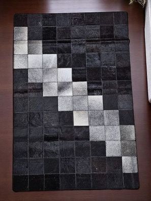 Patchwork Kuhfell Teppich mit Diagonalstreifen