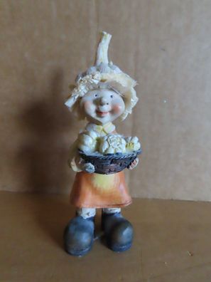 Figur Mädchen mit orangem Kleid u. Kürbis auf dem Kopf ca. 10,5 cm H