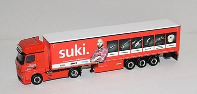 Herpa 941105 | MB Actros L Gigaspace | Gardinenplanen-Sattelzug | suki / Justen