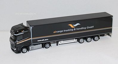 Herpa 953504 MB Actros ´18 Bigsp. Lowl.-Koffer-Sattel - aircargo trucking 1:87