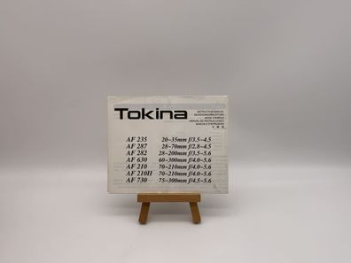 Tokina AF 235/AF 287/AF 282 Bedienungsanleitung Deutsch