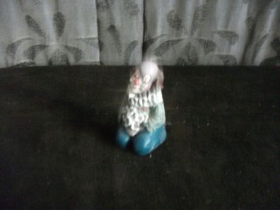 Gilde Clown mit weissen Blumen