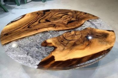 Transparenter runder Tisch mit Holzplatten innen