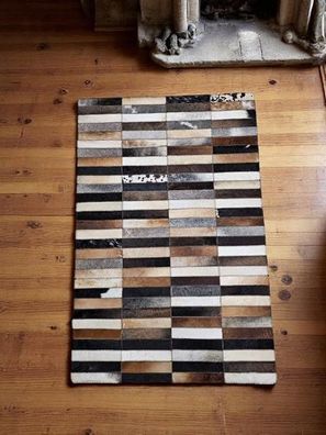 Patchwork Kuhfell Teppich mit klassischem Rechteckmuster