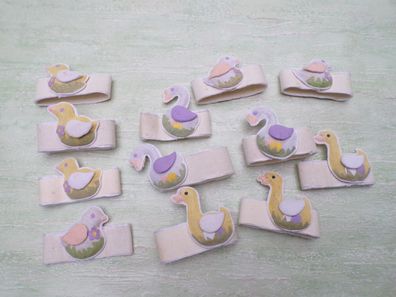 12 alte Stoff Serviettenringe Ente Küken pastell-weiß ca 4,5cm
