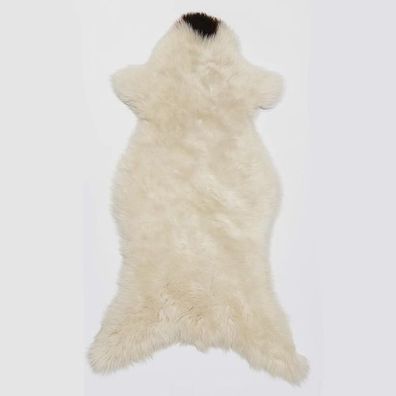 Skandinavisches Öko Schaffell - Weiß mit braunen Punkten