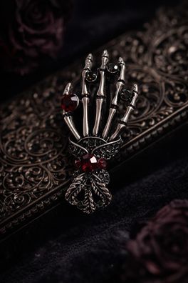 Vintage Emaille Brosche Skelett Hand mit Strasssteinen