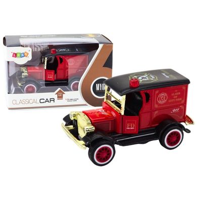 Klassisches Feuerwehrauto 1:36. Die Fahrlichter klingen rot