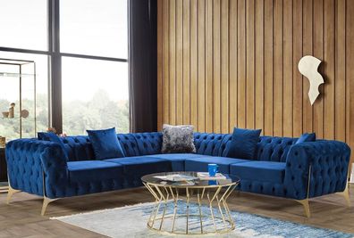 Ecksofa in sattem Blau mit filigranen Metallbeinen und Chesterfield-Steppung