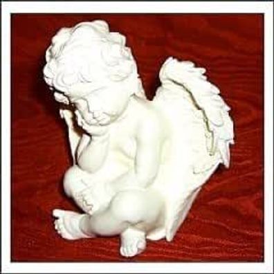 Engel figur sitzend