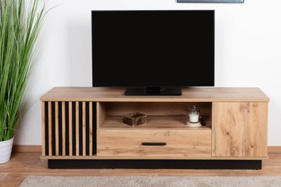 TV-Unterschrank Trevalli 7, Farbe: Eiche / Schwarz - Abmessungen: 51 x 155 x 40