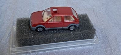 Citroen AX mit offenem Sonnendach, weinrot, Praline