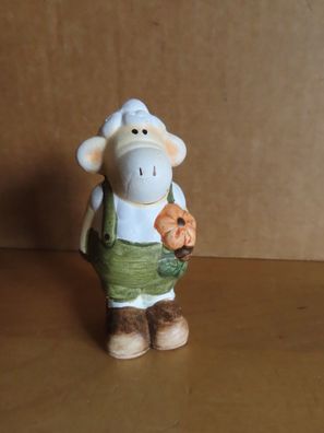 Figur Schaf steht mit grüner Hose und einer Blume ca. 7 cm H Keramik Amsel
