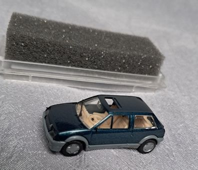 Citroen AX , grünmetallic mit offenem Sonnendach , Praline