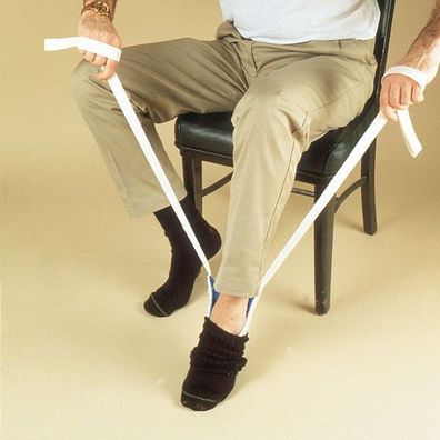 Socken - und Strumpfanziehhilfe aus flexiblem Kunststoff