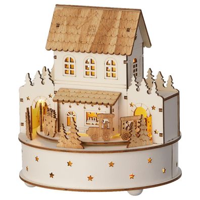 Lumineo Batterie LED Weihnachts-Szene Haus mit 2 Torbögen Bewegung & Musik Ø 17,5 cm