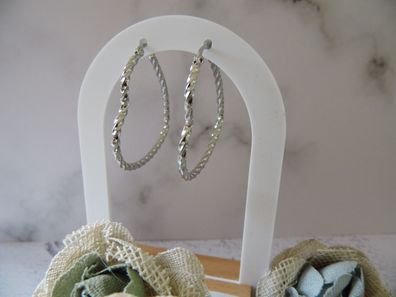 Elegante Edelstahlohrringe in Herzform in Silber