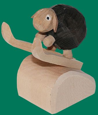 Holzfigur Schaf geschnitzt Skispringer dunkel 7 cm Schäfchen Wollschaf Lamm