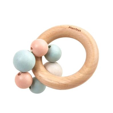 Holz Babyrassel – Motorikspielzeug für Babys