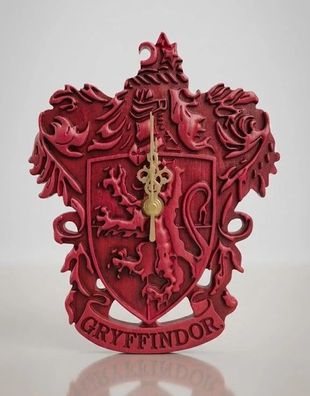 Harry Potter Wanduhr in Wappenform Gryffindor 16x15 cm