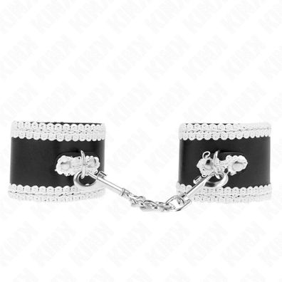 KINK Handgelenkfesseln Schwarz mit weißer verzierter Spitze, 20-23x5,5cm